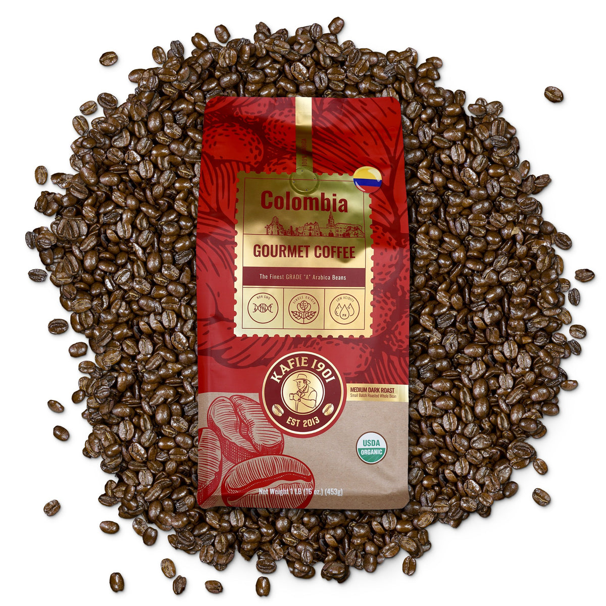 Kafie 1901 Colombia Supremo organic whole bean coffee, 1 lb bag on a pile of roasted coffee beans