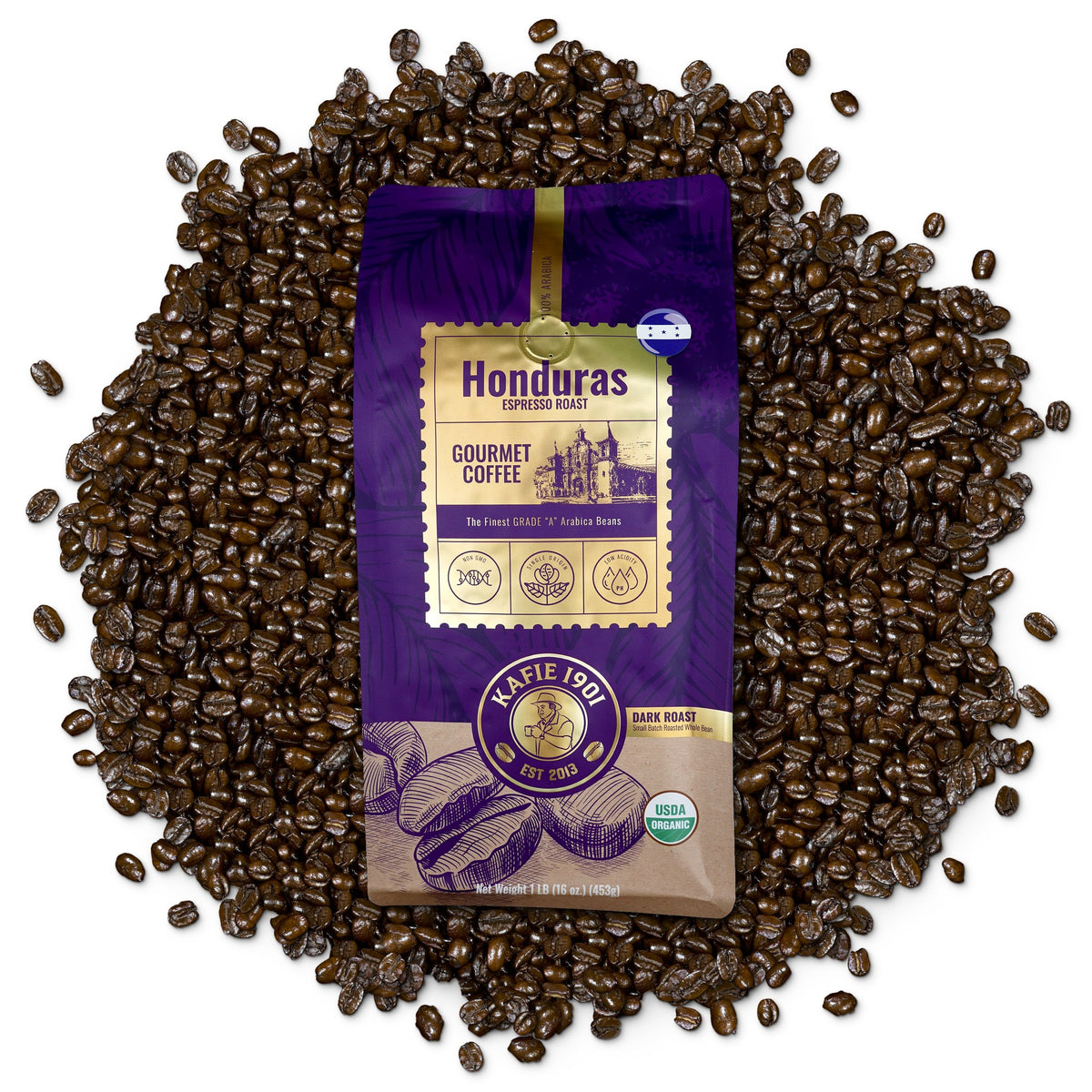 Kafie 1901 Honduras Espresso Roast organic whole bean coffee, 1 lb bag on a pile of roasted coffee beans