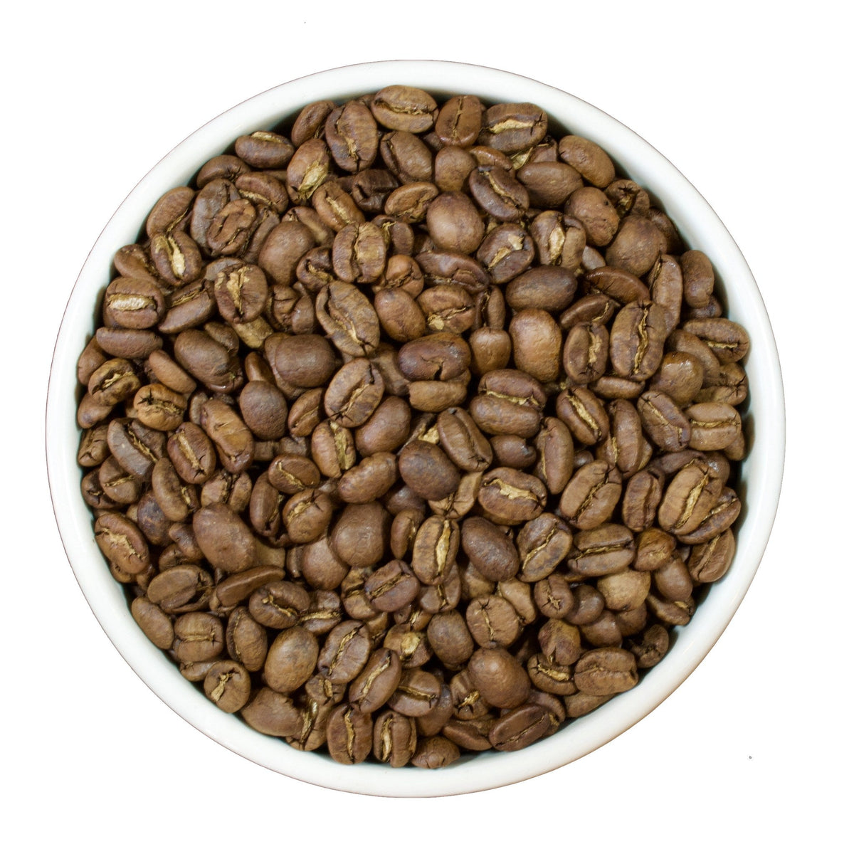 Roasted Sumatra Mandheling coffee beans showing the medium roast color, low acid whole bean